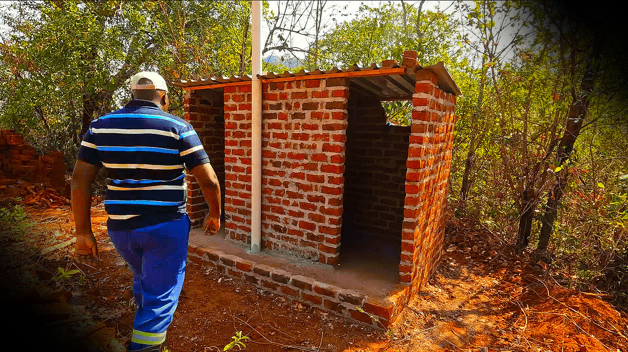 Building an outdoor toilet in rural Zimbabwe